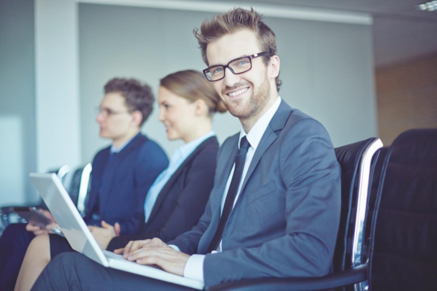 Business owner reviewing strategic plans with confidence